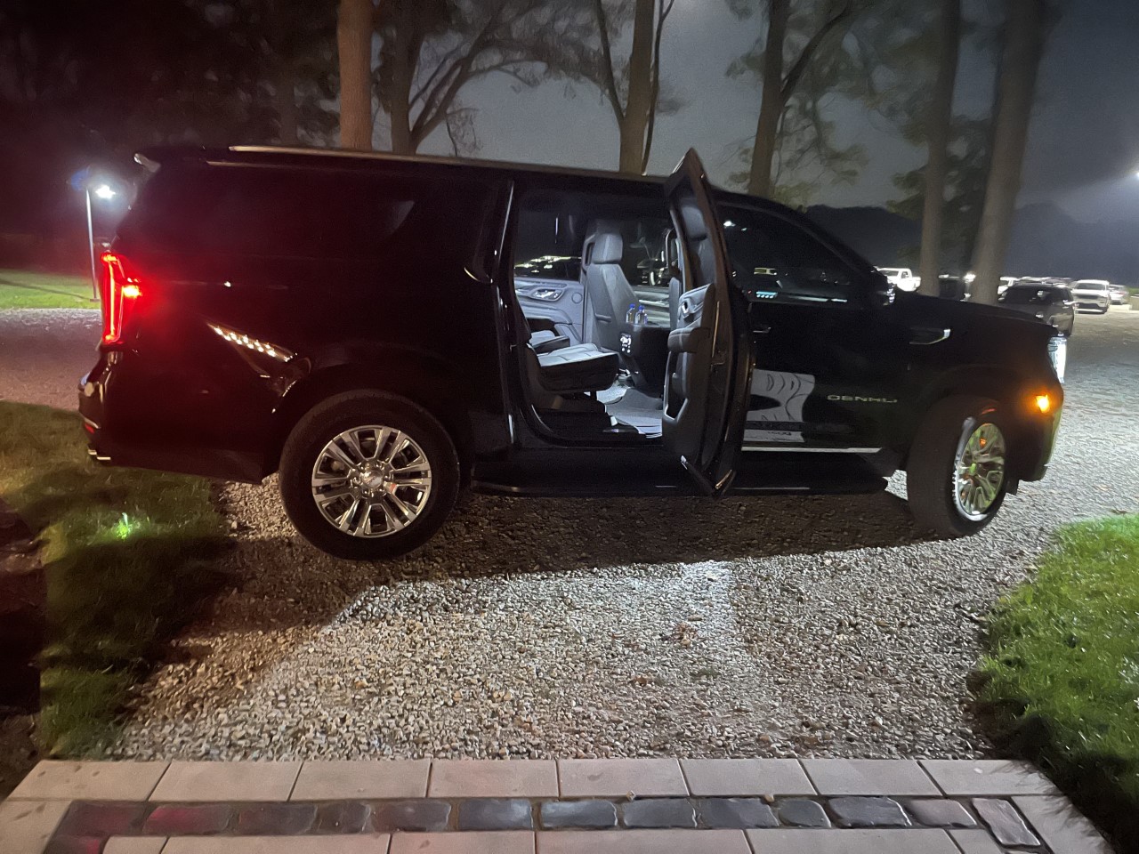 A black car with open door