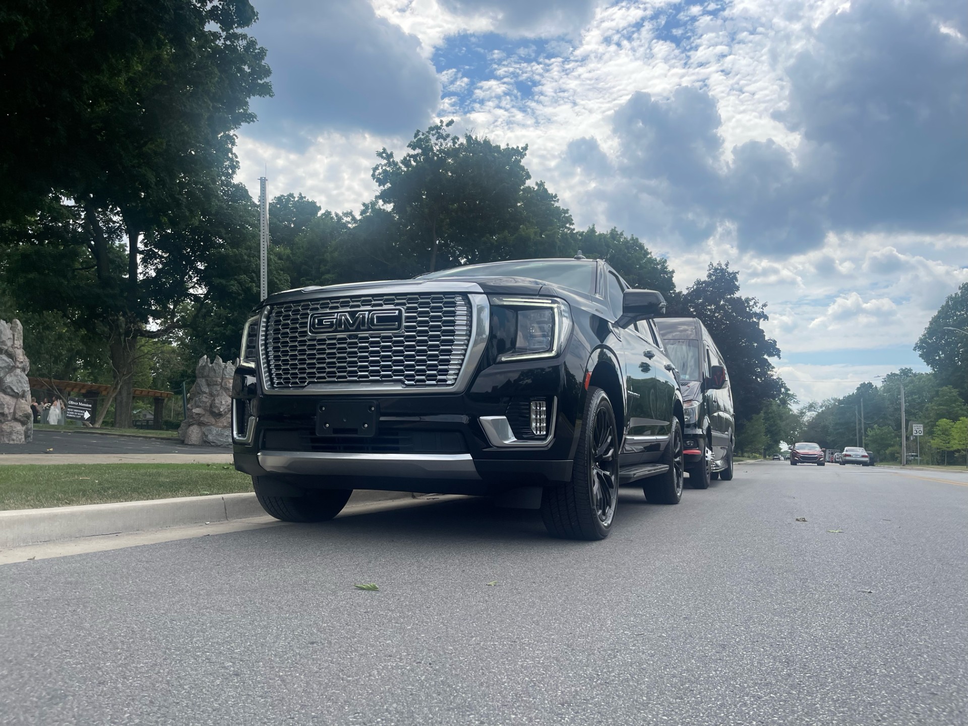 GMC Denali Limo with a Mercedes Benz Sprinter Limo Downtown South Bend Indiana